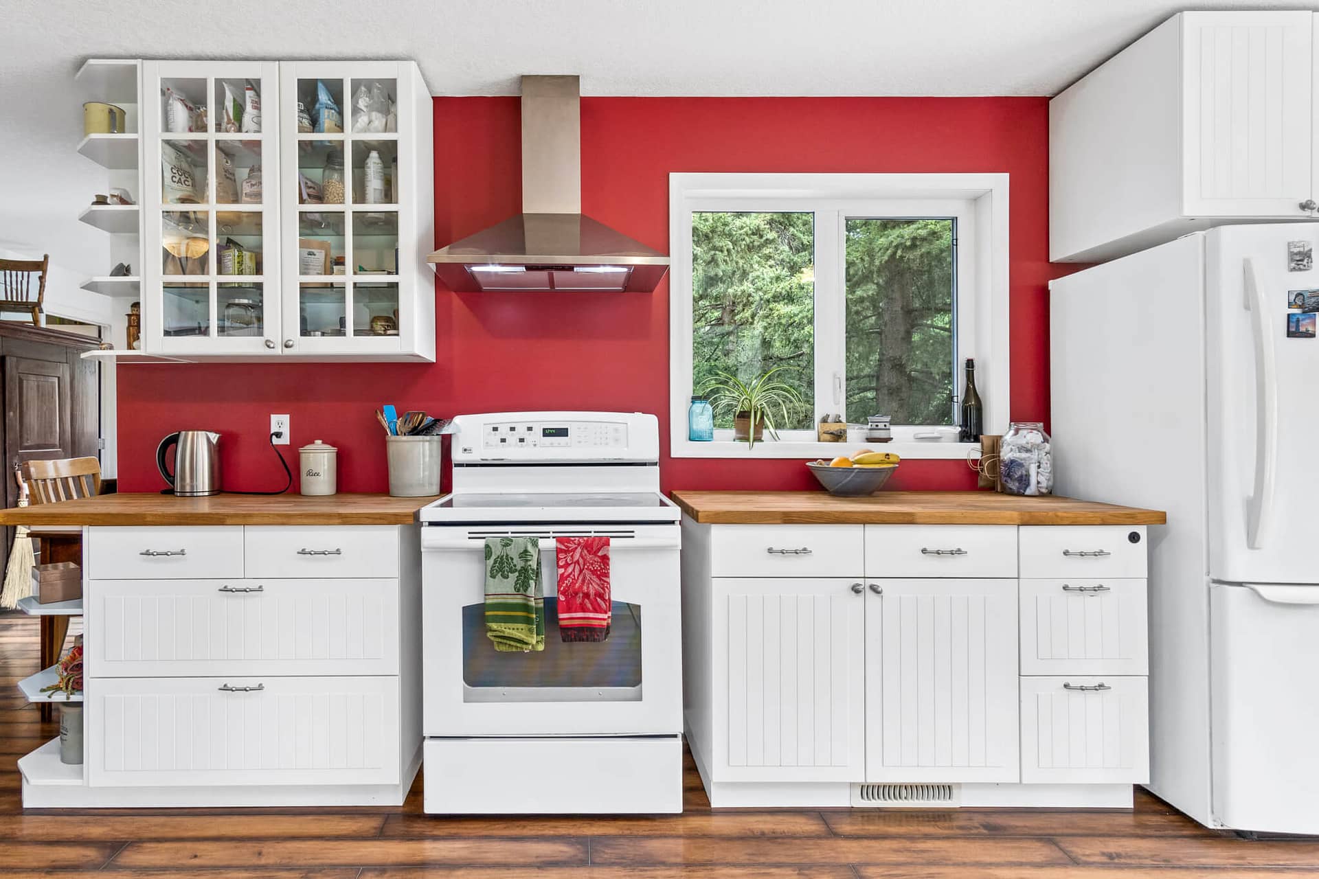 Country kitchen with red walls and white accents